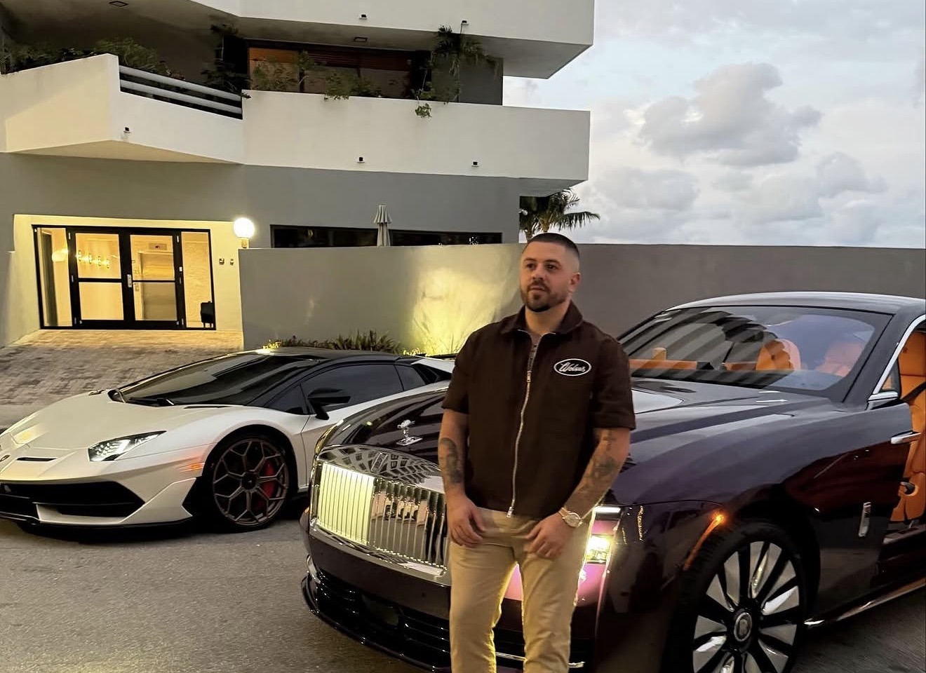 Joey Crivelli with luxury cars and mansion